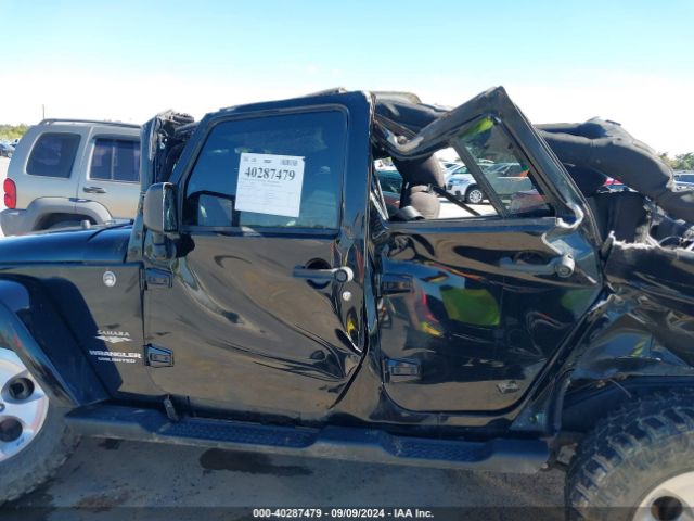 1C4BJWEG1EL135914 Jeep Wrangler Unlimited Sahara
