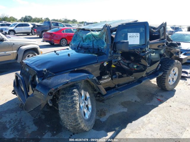 1C4BJWEG1EL135914 Jeep Wrangler Unlimited Sahara