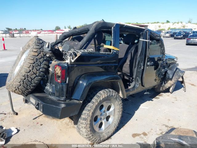 1C4BJWEG1EL135914 Jeep Wrangler Unlimited Sahara