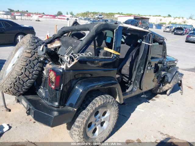 1C4BJWEG1EL135914 Jeep Wrangler Unlimited Sahara