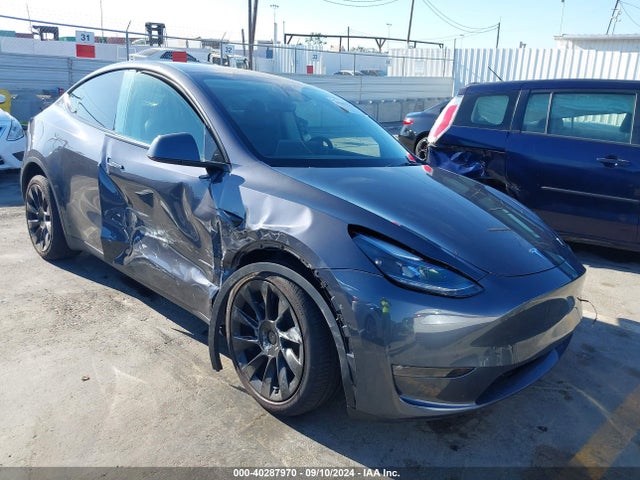 2023 TESLA MODEL Y 7SAYGDEE8PF904509 Photo 0