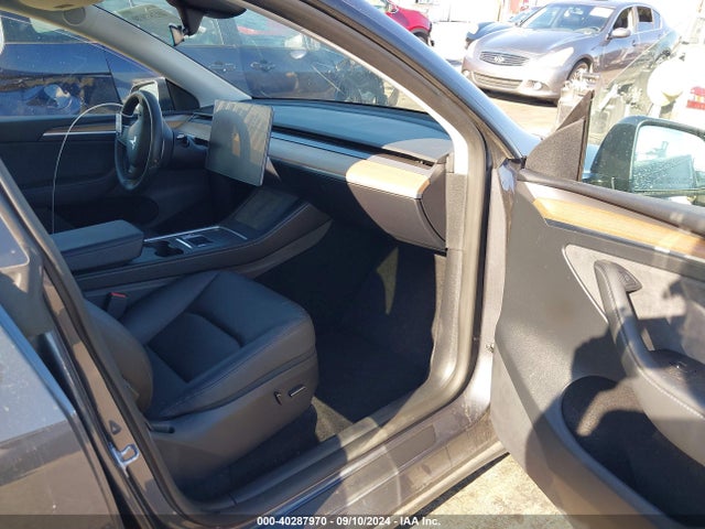 2023 TESLA MODEL Y 7SAYGDEE8PF904509 Photo 4