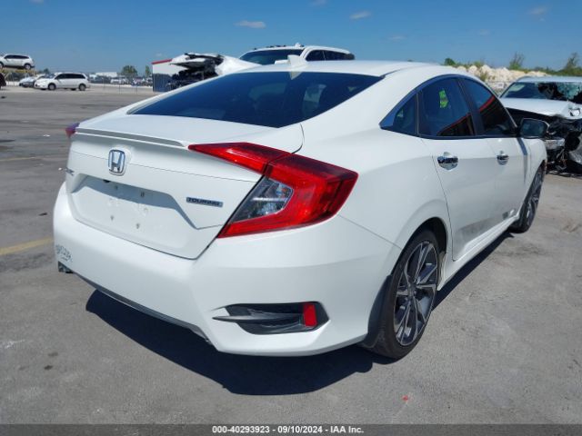 JHMFC1F95KX004454 Honda Civic Touring