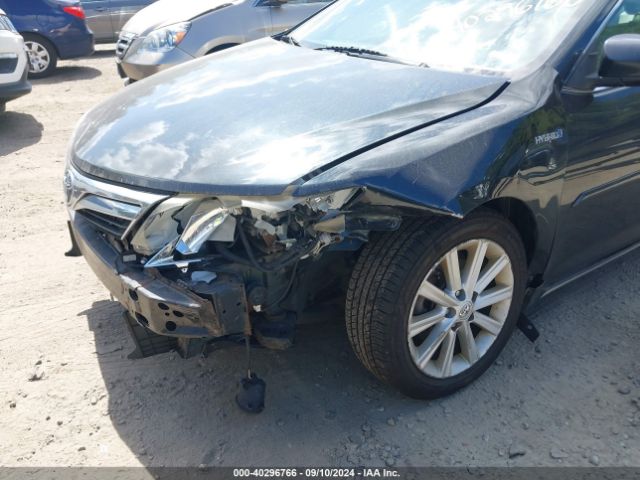 4T1BD1FK9EU112061 Toyota Camry Hybrid Xle