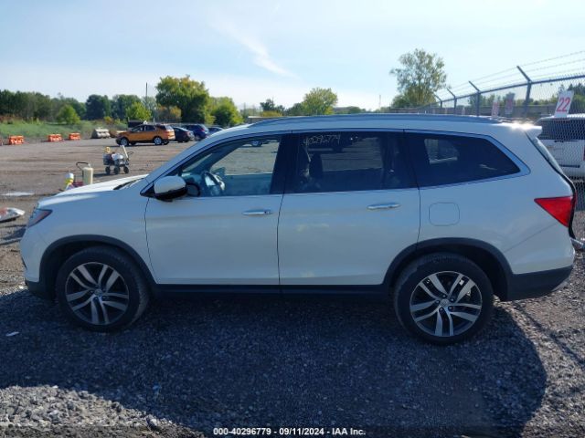 5FNYF6H94HB090144 Honda Pilot Touring