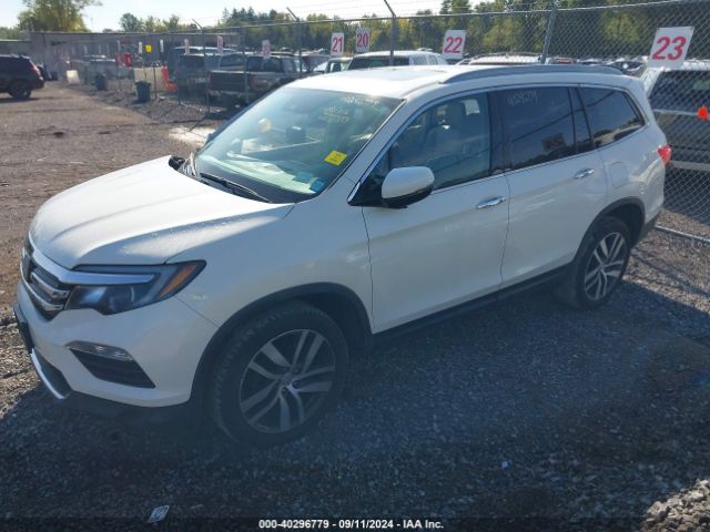5FNYF6H94HB090144 Honda Pilot Touring