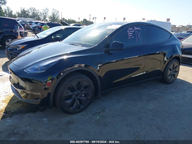 2024 TESLA MODEL Y 7SAYGDED9RF098321 Photo 1