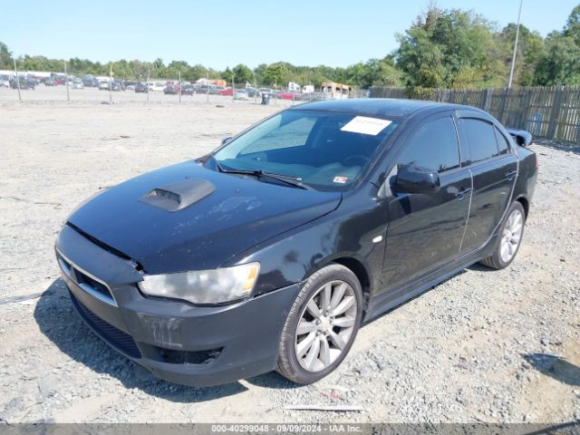 2009 MITSUBISHI LANCER JA3AU86W99U027396 Photo 1