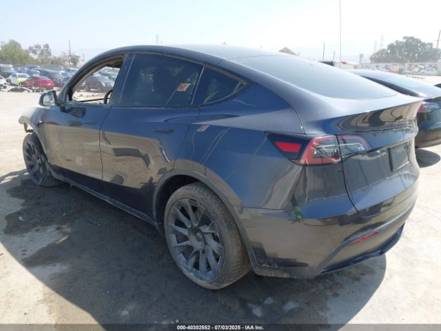 2024 TESLA MODEL Y 7SAYGDEE0RA243073 Photo 2
