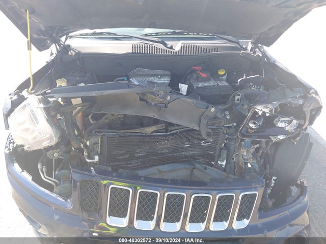 1C4NJCBA4ED689888 Jeep Compass Sport