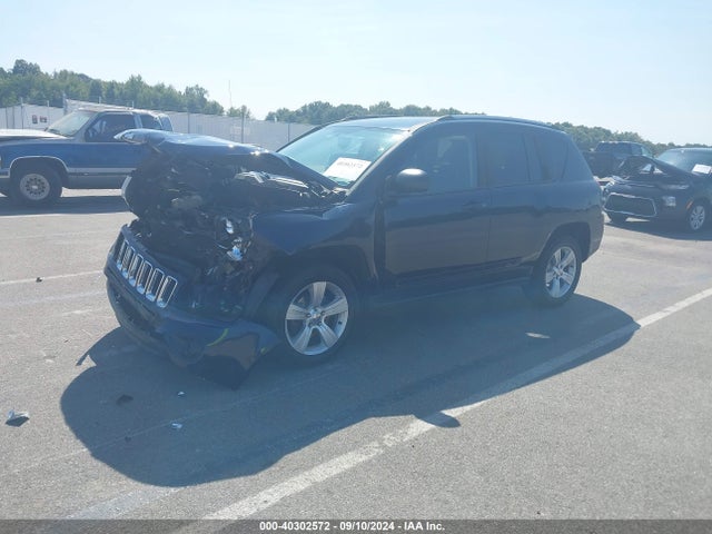 1C4NJCBA4ED689888 Jeep Compass Sport