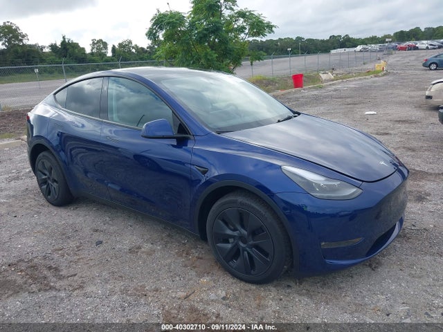 2024 TESLA MODEL Y 7SAYGDEE0RA320489 Photo 0