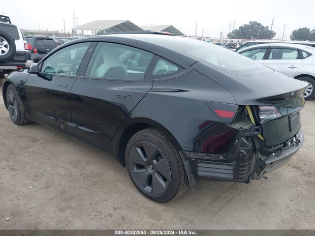 2023 TESLA MODEL 3 5YJ3E1EB2PF389895 Photo 2