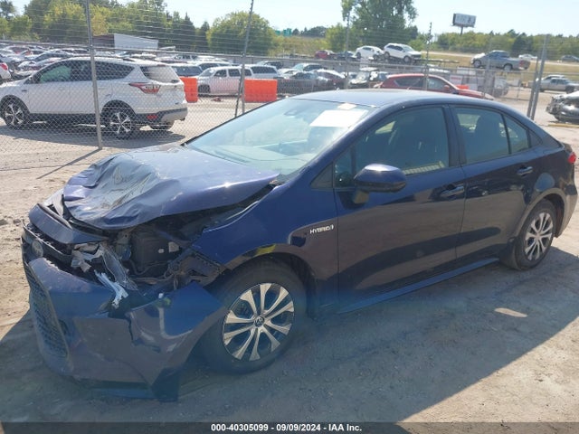Toyota Corolla Hybrid Le 2021 JTDEAMDE2MJ003272 Image 2