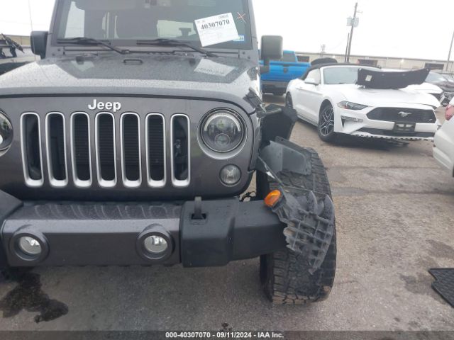 1C4HJWEG1GL165850 Jeep Wrangler Unlimited Sahara
