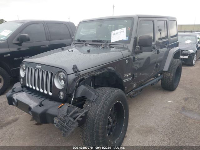 1C4HJWEG1GL165850 Jeep Wrangler Unlimited Sahara