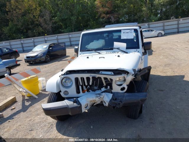 1C4AJWBG5GL128645 Jeep Wrangler Sahara