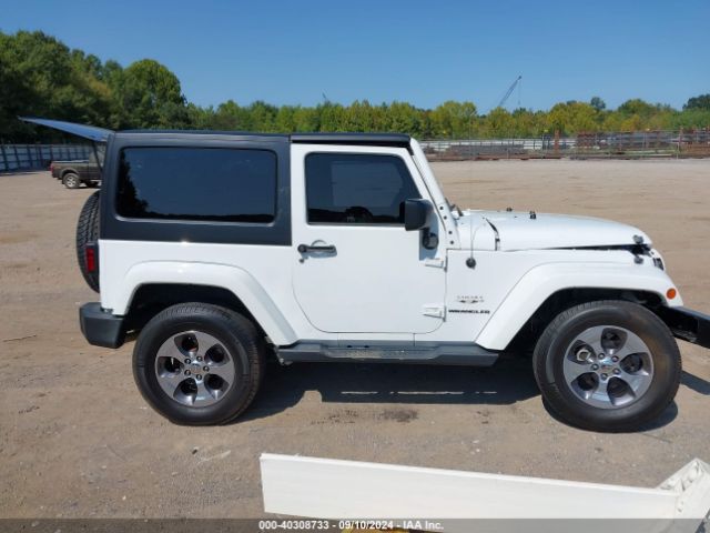 1C4AJWBG5GL128645 Jeep Wrangler Sahara