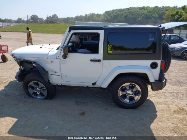 1C4AJWBG5GL128645 Jeep Wrangler Sahara