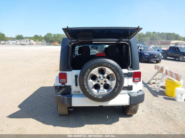 1C4AJWBG5GL128645 Jeep Wrangler Sahara