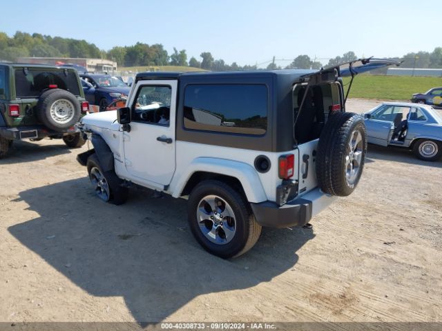 1C4AJWBG5GL128645 Jeep Wrangler Sahara