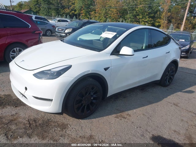 2023 TESLA MODEL Y 7SAYGAEEXPF831514 Photo 1