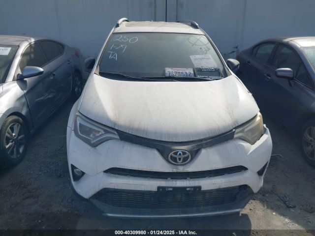 2T3NFREVXGW262529 Toyota RAV4 SE