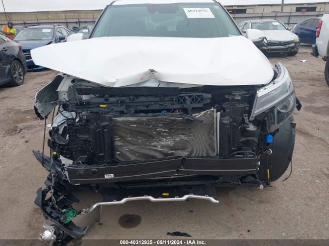 KNDER2AA7R7629158 KIA SELTOS EX