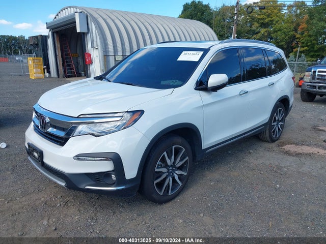 Honda Pilot Awd Touring 7 Passenger 2022 5FNYF6H67NB095680 Image 2