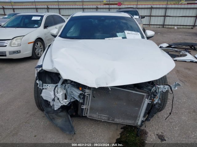 JM1BPBMLXM1348084 Mazda Mazda3 Premium