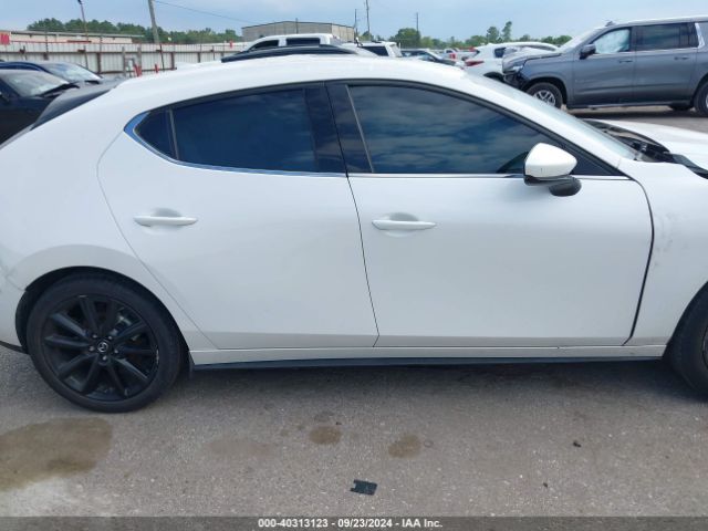 JM1BPBMLXM1348084 Mazda Mazda3 Premium