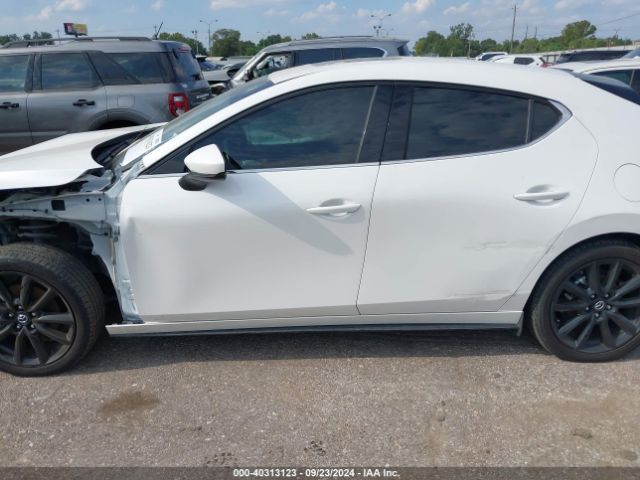 JM1BPBMLXM1348084 Mazda Mazda3 Premium