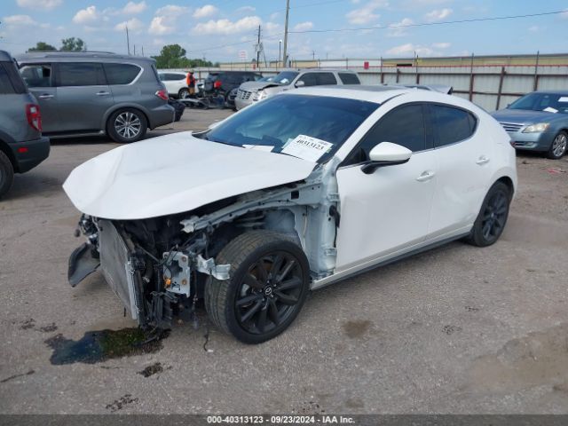 JM1BPBMLXM1348084 Mazda Mazda3 Premium