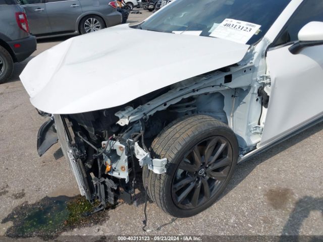JM1BPBMLXM1348084 Mazda Mazda3 Premium
