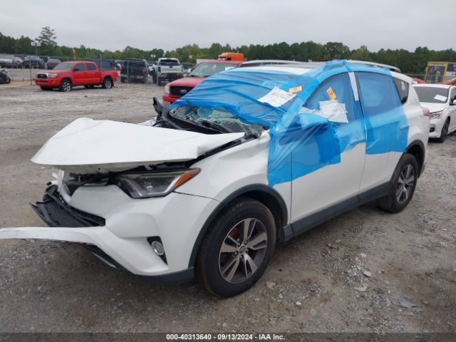 JTMWFREV7GD085987 Toyota Rav4 Xle
