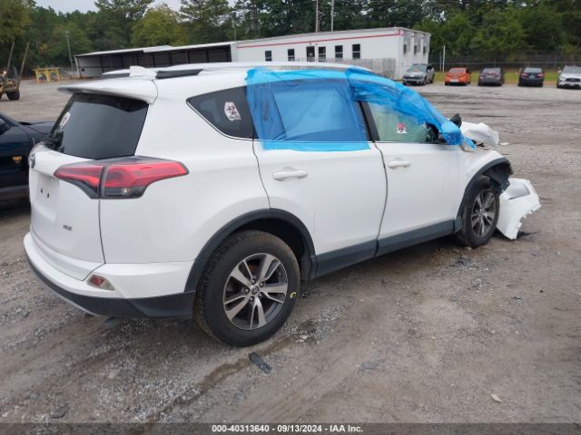 JTMWFREV7GD085987 Toyota Rav4 Xle