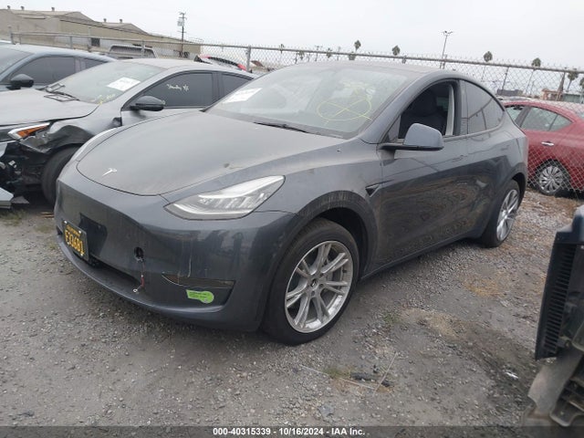 2023 TESLA MODEL Y 7SAYGDEE1PA039525 Photo 1
