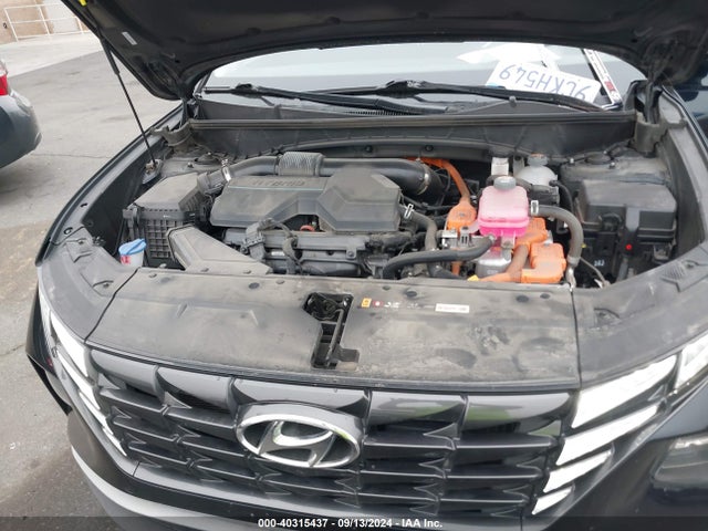KM8JBCA10NU075896 Hyundai Tucson Hybrid Blue