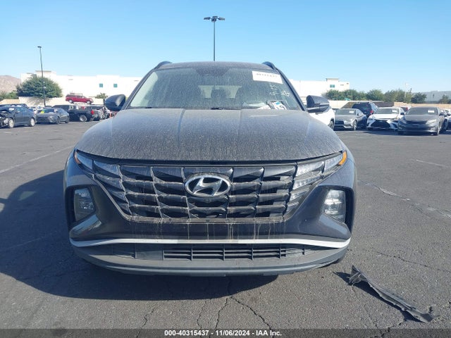 KM8JBCA10NU075896 Hyundai Tucson Hybrid Blue