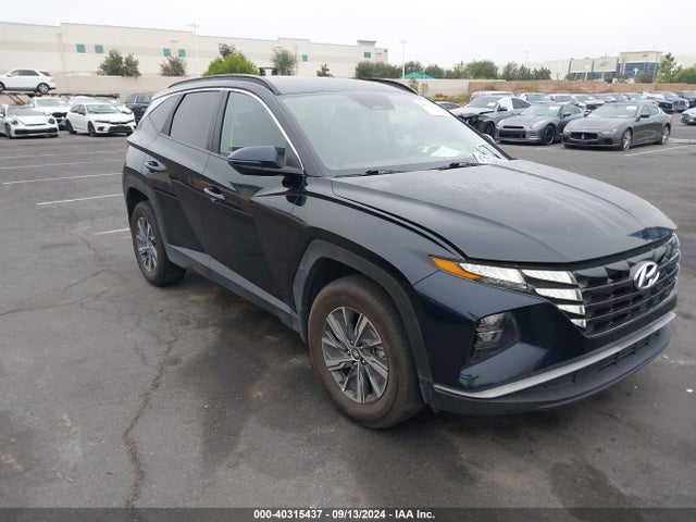 KM8JBCA10NU075896 Hyundai Tucson Hybrid Blue