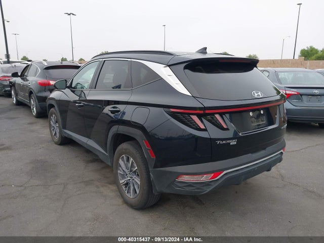 KM8JBCA10NU075896 Hyundai Tucson Hybrid Blue