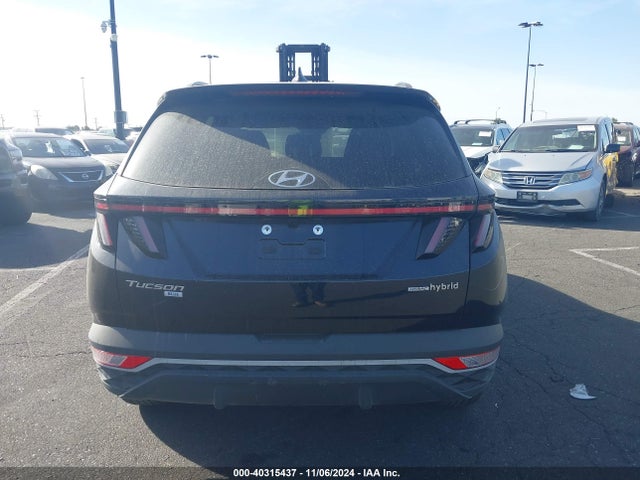 KM8JBCA10NU075896 Hyundai Tucson Hybrid Blue