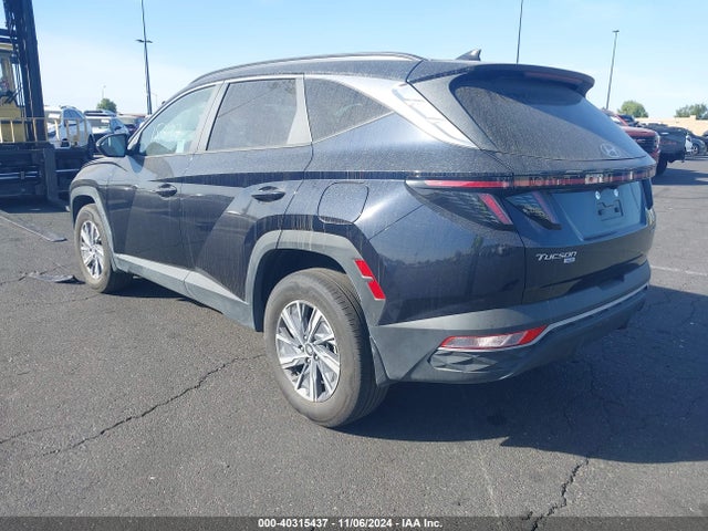 KM8JBCA10NU075896 Hyundai Tucson Hybrid Blue