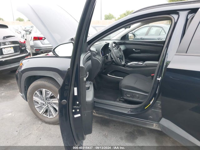 KM8JBCA10NU075896 Hyundai Tucson Hybrid Blue