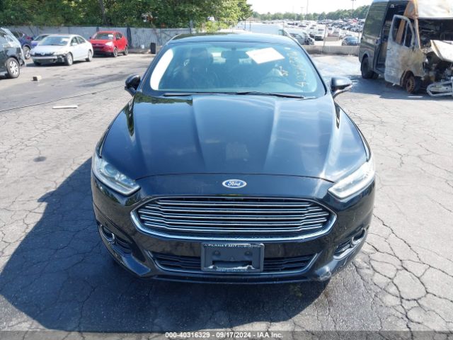 3FA6P0D9XGR129233 Ford Fusion Titanium