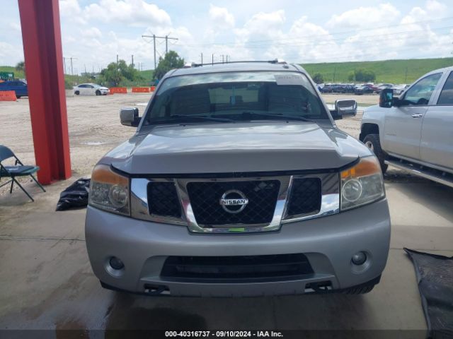 5N1BA0ND0EN611198 Nissan Armada Sl