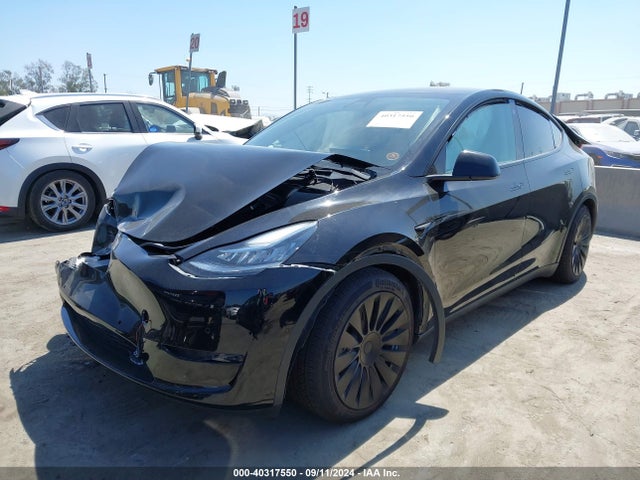 2021 TESLA MODEL Y 5YJYGAEE0MF299487 Photo 1