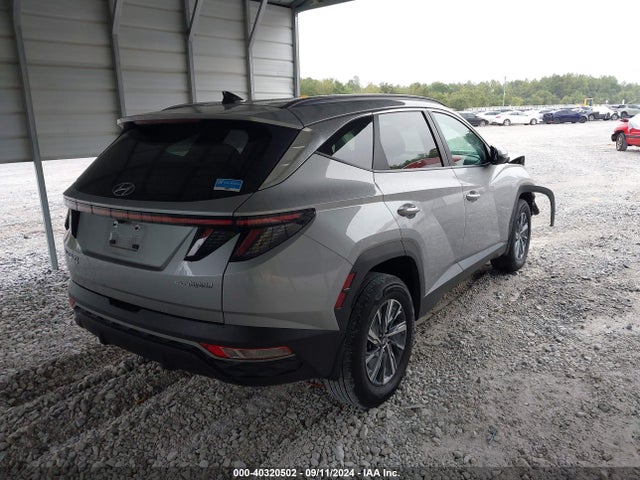 KM8JBCA1XPU103299 Hyundai Tucson Hybrid Blue