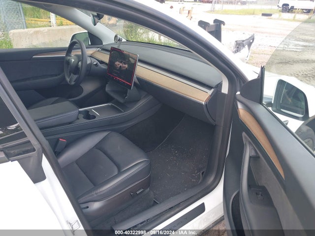 2023 TESLA MODEL Y 7SAYGAEE3PF589584 Photo 4