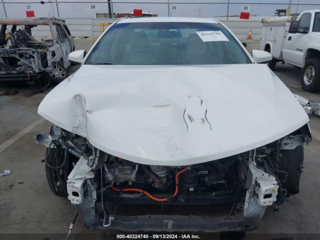 4T1BD1FK1EU099581 Toyota Camry Hybrid Le